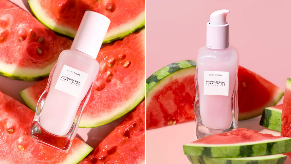 A moisturizer sits among cut watermelons.