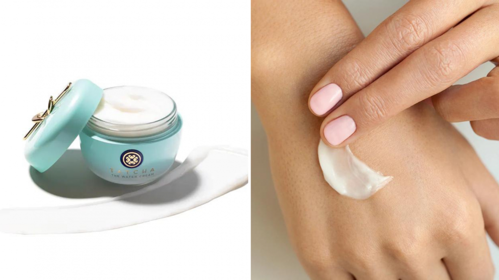 A person smooths moisturizer onto the back of their hand, and a streak of moisturizer sits in front of a jar.