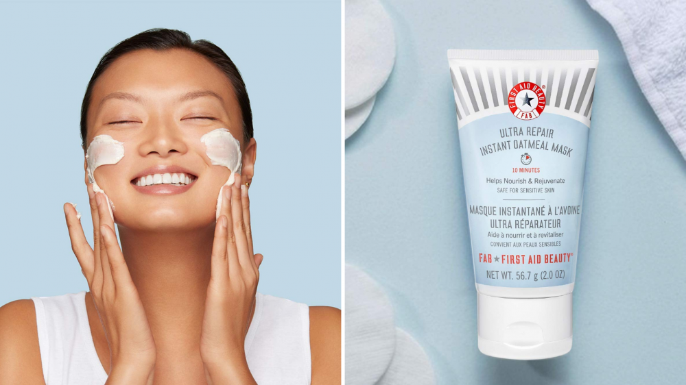 A woman applies a face mask, and a face mask container sits among cotton pads.