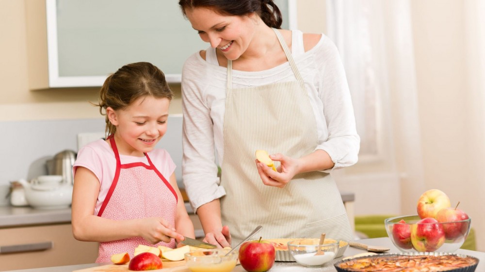 A mother bakes with her child